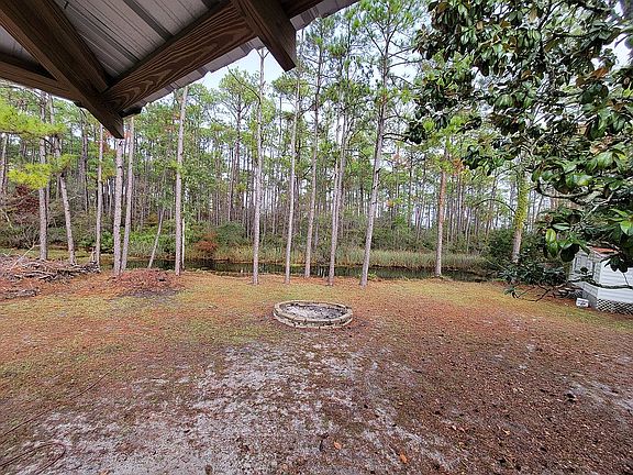 Backyard, 150' of canal