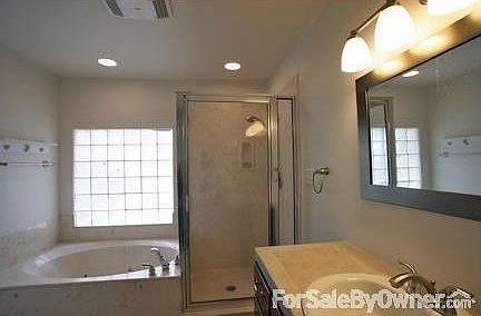 Kitchen
						:
						Custom cabinets, granite countertops, new stainless steel appliances