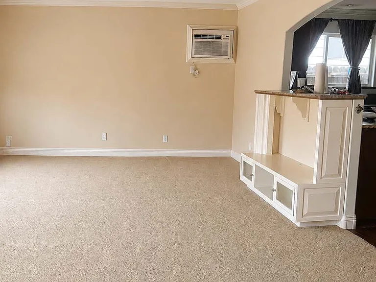 Living room- next to kitchen