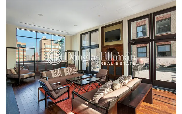 Sold by Douglas Elliman | media 18