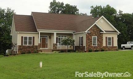 Front
						:
						architectural shingles, vinyl siding with rock accents, concrete porch