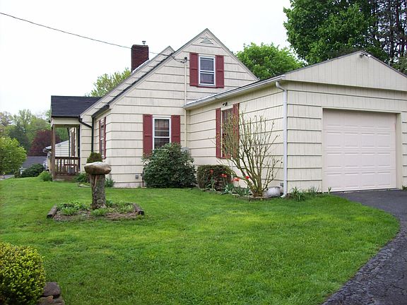 side of house with attached garage 
