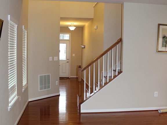Front Hall Entryway (with half bath on the left)