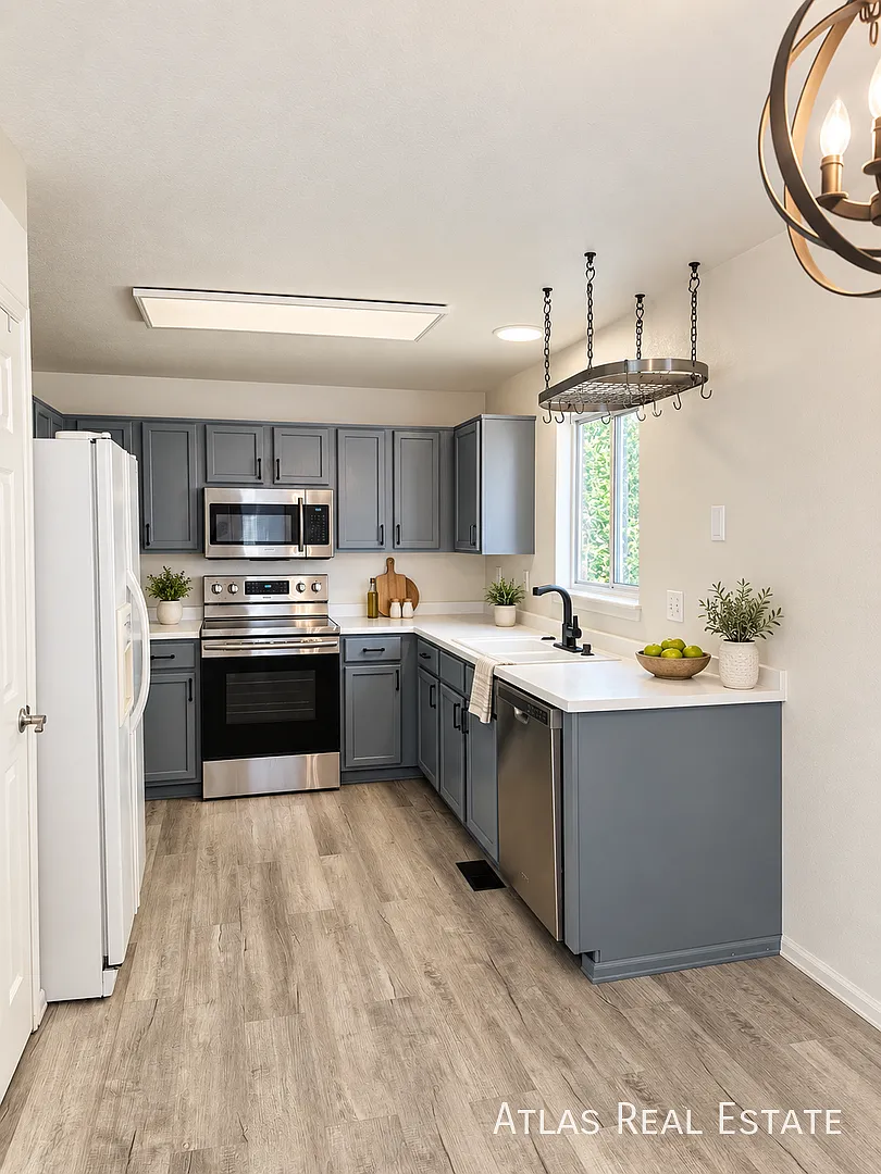 Spacious 2-Bedroom Home with 2-Car Garage, EV Charging Outlet, Basement and Large Fenced Yard! — Photo 4