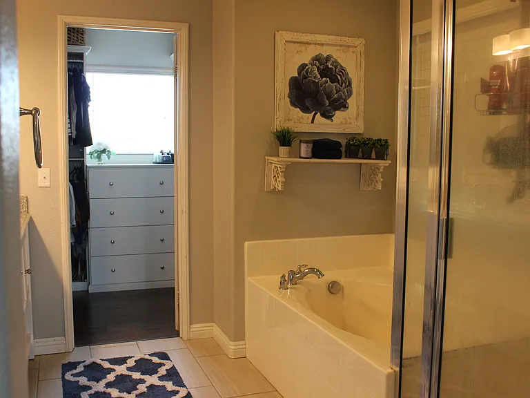 Primary bathroom with soaking tub and seperate shower