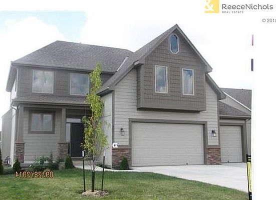 Open concept two story home. (photo from a prior model)