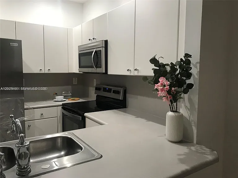 5743 NW 114th Path #106 — Photo 7