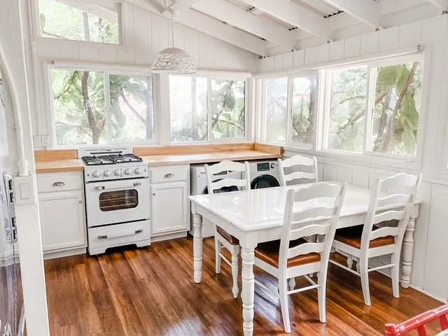 Dining room with gas stove & washer/dryer