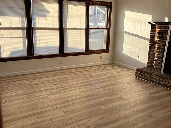 Living room, fireplace to the right.