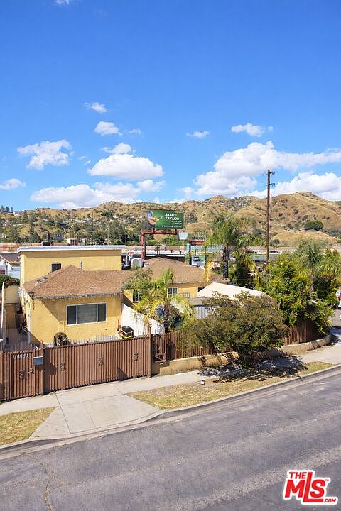 1st image of 7703 N Hollywood Way