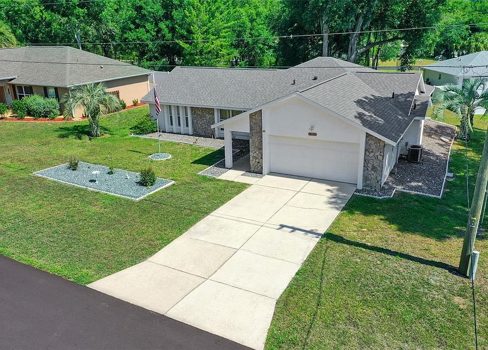 13027 NE 7th Loop, Silver Springs, FL 34488 | MLS #OM679956