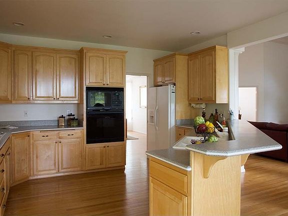 Spacious kitchen with view, walk-in pantry