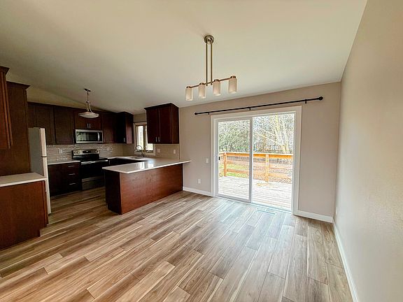 Dinning space and fully-renovated kitchen