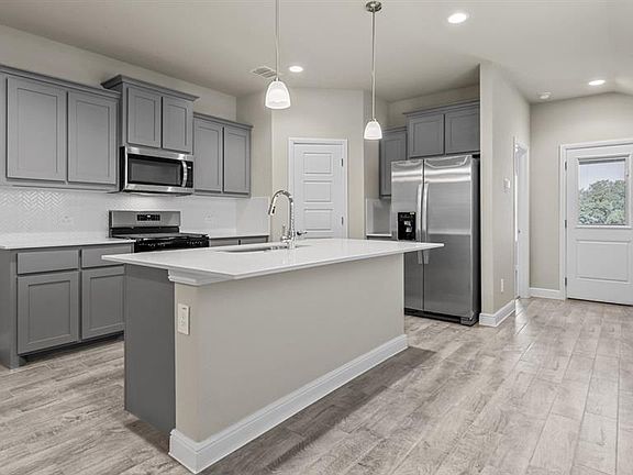 Kitchen - All Home and community information, including pricing, included features, terms, availability and amenities, are subject to change at any time without notice or obligation. All Drawings, pictures, photographs, video, square footages, floor plans, elevations, features, colors and sizes are approximate for illustration purposes only and will vary from the homes as built.