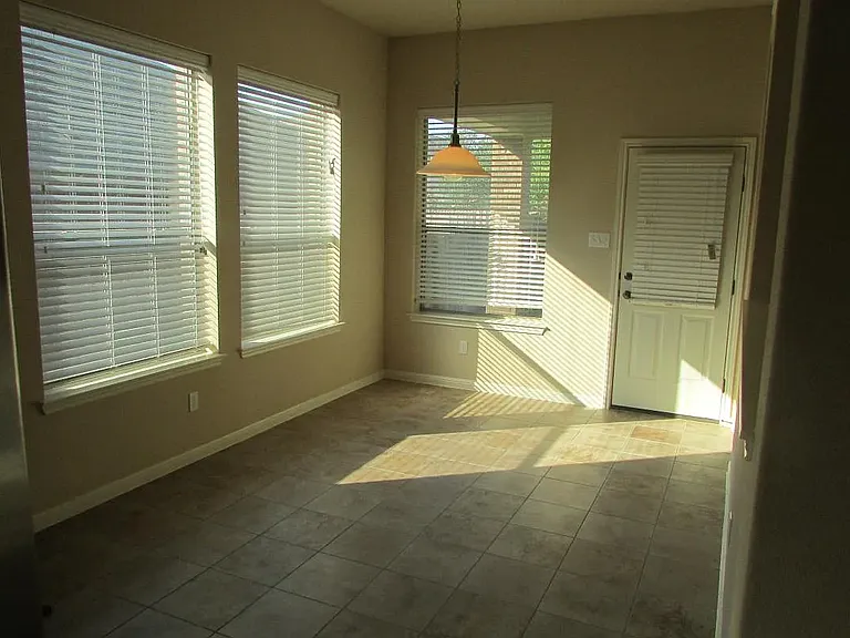 breakfast nook and exit door to the back yard