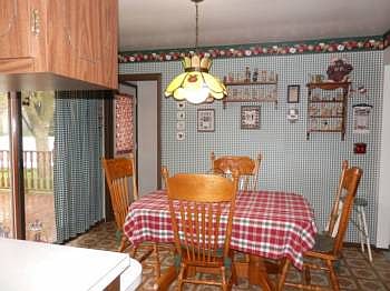 Convenient dining area adjacent to kitchen