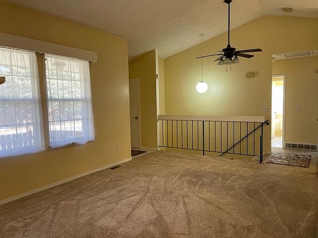 Living room looking toward entry and bedrooms.