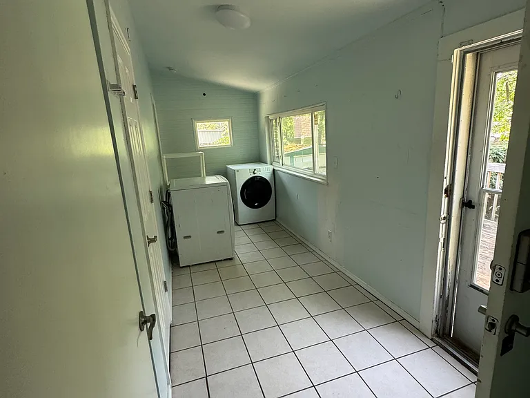 Laundry Room with Electric Washer/ Dryer