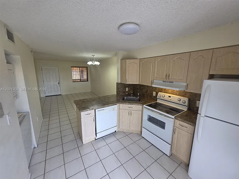 5560 W 21st Ct #308 — Photo 13