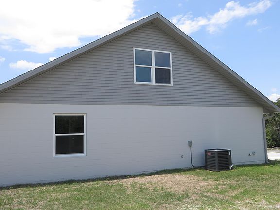 Exterior Side with Attic/Bonus Room Window