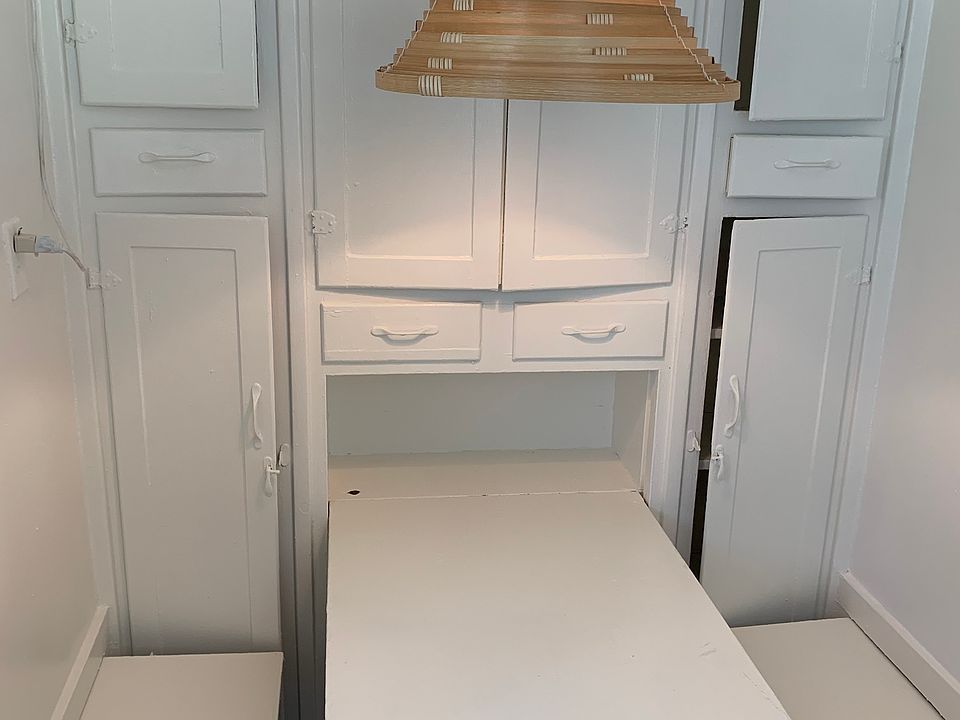 Built in dining area in kitchen, folds up out of the way