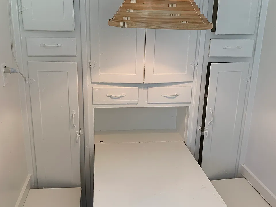 Built in dining area in kitchen, folds up out of the way