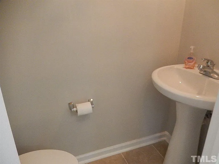 Downstairs Guest 1/2 Bath with pedistal sink.