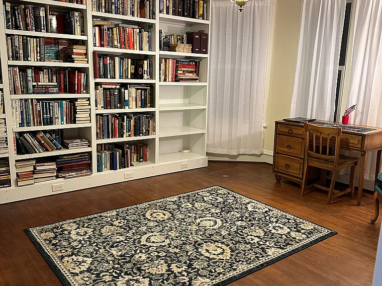 Home office with library.