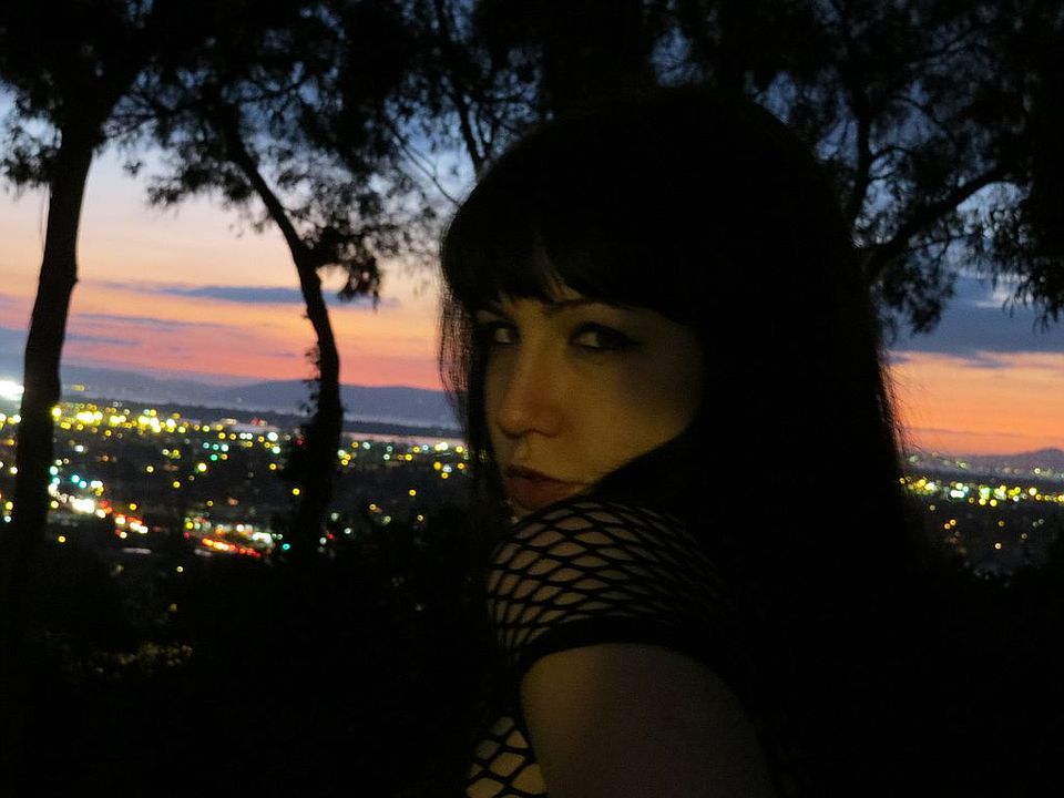 night time city lights and sun