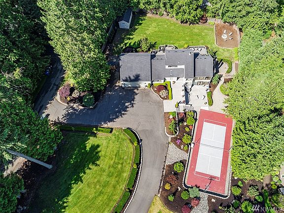 Fabulous 1.23 Acre Lot With Gorgeous Landscaping. Lighted Sport Court, Large Back Decks, Fenced Yard, Fire Pit Area, Landscape Lighting, In-Ground Sprinkler System, 200 sq/ft Shed, Garden Space, And Mature Landscaping. The Back Decks Have Been Recently Refinished And Stained.
