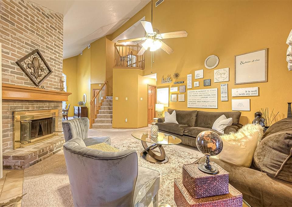 Welcome to this gorgeous 3 bed, 2.5 bath home in the heart of Meadowcreek! The centerpiece of this home is this spacious living room that opens up to the formal dining. This room boasts high ceilings and a grand fireplace!