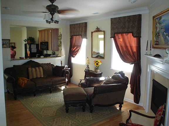 Living Room with Kitchen area in background