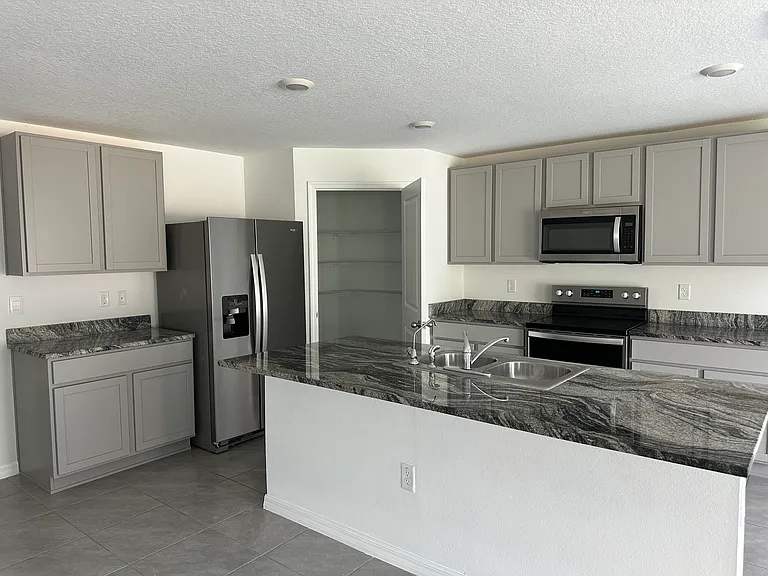 7715 Rosewood Garden Loop — Photo 11