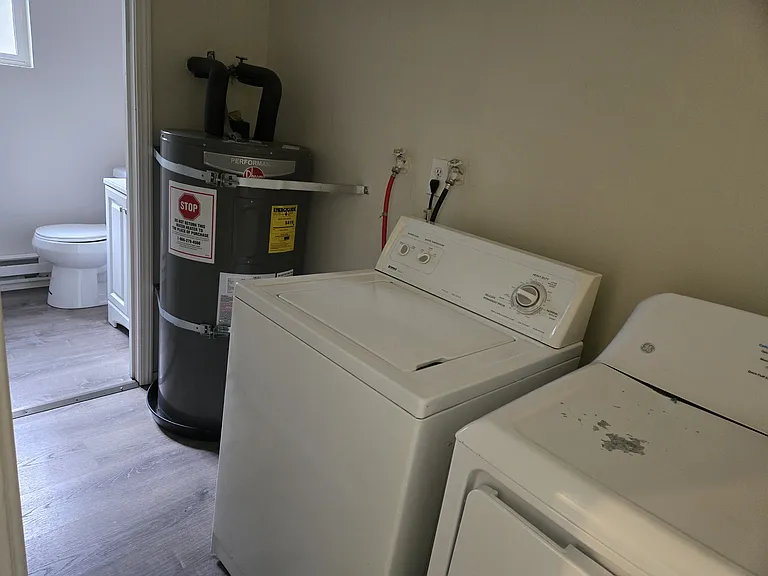 Laundry room with 1/2 bathroom