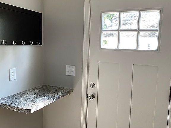 Back door enters kitchen