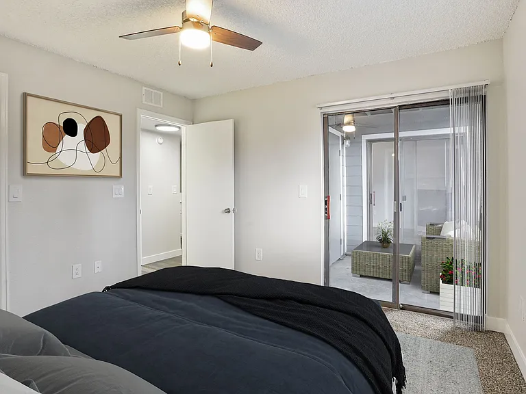 A Bedroom leading to Private Balcony at Horizon East Apartments