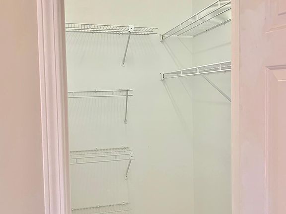 Bedroom with Walk-In Closet