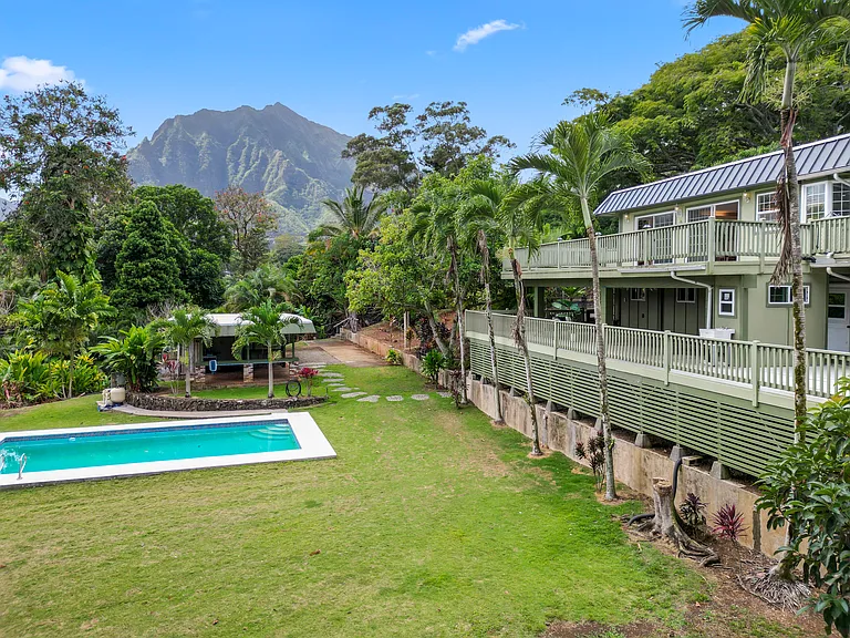Side view of the home. Rental includes the upstairs unit only.