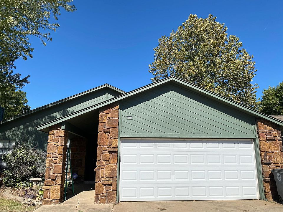 Exterior of house freshly painted with rich color