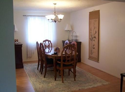 Beautiful Dining Room With New Pergo Flooring