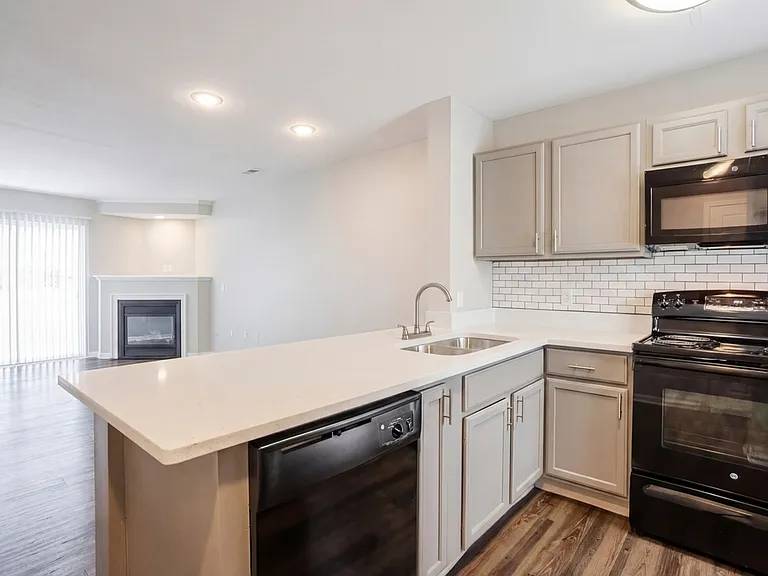 Kitchen and Living Room With Fire Place