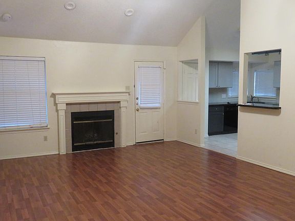 Open living room with lofted ceiling