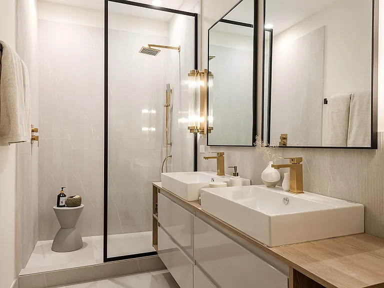 Ensuite Primary Bathroom with Dual Sink Vanity and Shower