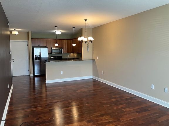 There is room for a dining room table and also bar stools for countertop eating.