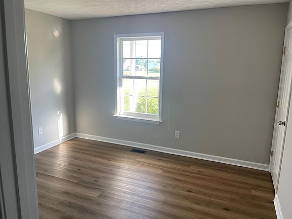 Spare bedroom with walk in closet