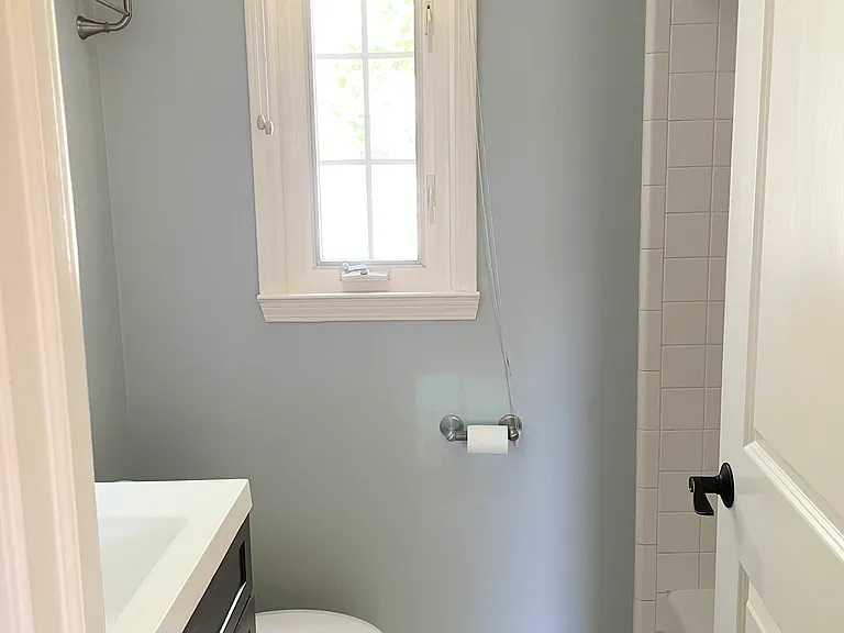 Bathroom with vanity and extra towel storage