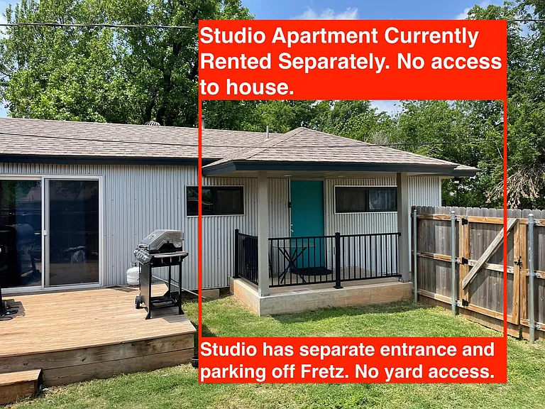 Studio currently rented to an individual. It has it's own entrance and parking off Fretz with no access to the "main house". No shared yard access.