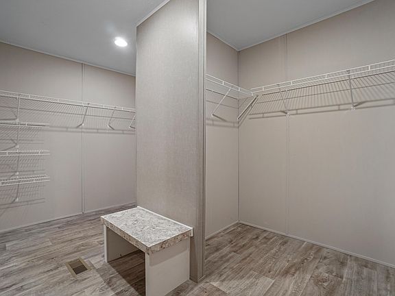 Walk-in closet for his/her.