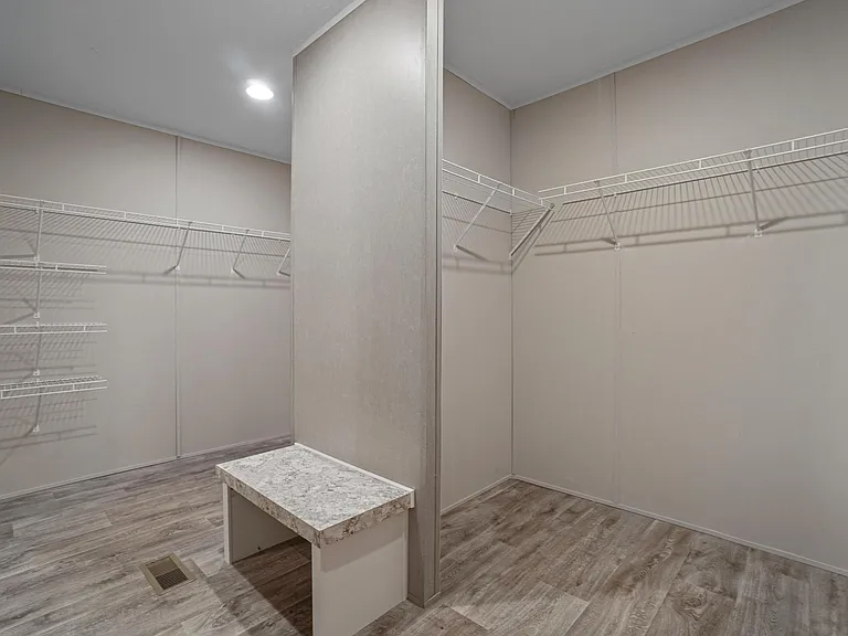 Walk-in closet for his/her.