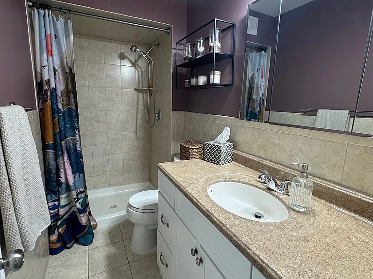 Master bathroom with shower.